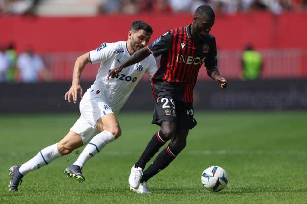 Nice, France, 28th August 2022. Nicolas Pepe of OGC Nice is pursued by Sean Kolasinac of Olympique De Marseille during the Uber Eats Ligue 1 match at Allianz Riviera Stadium, Nice. Picture credit should read: Jonathan Moscrop Sportimage EDITORIAL USE ONLY. No use with unauthorised audio, video, data, fixture lists, club league logos or live services. Online in-match use limited to 120 images, no video emulation. No use in betting, games or single club league player publications. SPI-1813-0004