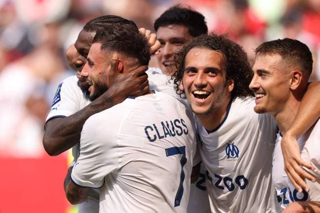 Nice, France, 28th August 2022. Nuno Tavares of Olympique De Marseille celebrates with team mates after scoring to give the side a 2-0 lead during the Uber Eats Ligue 1 match at Allianz Riviera Stadium, Nice. Picture credit should read: Jonathan Moscrop Sportimage EDITORIAL USE ONLY. No use with unauthorised audio, video, data, fixture lists, club league logos or live services. Online in-match use limited to 120 images, no video emulation. No use in betting, games or single club league player publications. SPI-1813-0011