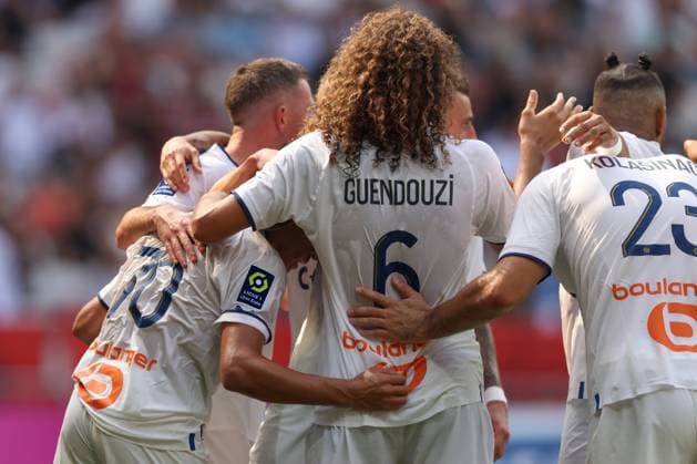 Nice, France, 28th August 2022. Alexis Sanchez of Olympique De Marseille celebrates with team mates after scoring his second goal to give the side a 3-0 lead during the Uber Eats Ligue 1 match at Allianz Riviera Stadium, Nice. Picture credit should read: Jonathan Moscrop Sportimage EDITORIAL USE ONLY. No use with unauthorised audio, video, data, fixture lists, club league logos or live services. Online in-match use limited to 120 images, no video emulation. No use in betting, games or single club league player publications. SPI-1813-0017