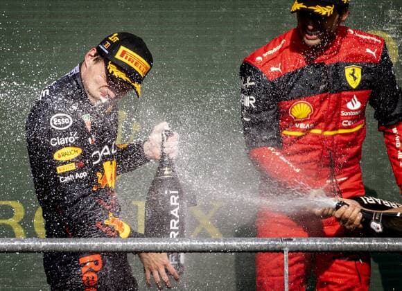 SPA - Max Verstappen celebrates his victory with Carlos Sainz (R) on the podium after the F1 Grand Prix of Belgium at the Circuit de Spa-Francorchamps on August 29, 2022 in SPA, Belgium. ANP SEM VAN DER WAL F1 Grand Prix of Belgium 2022 xVIxANPxSportx xxANPxIVx