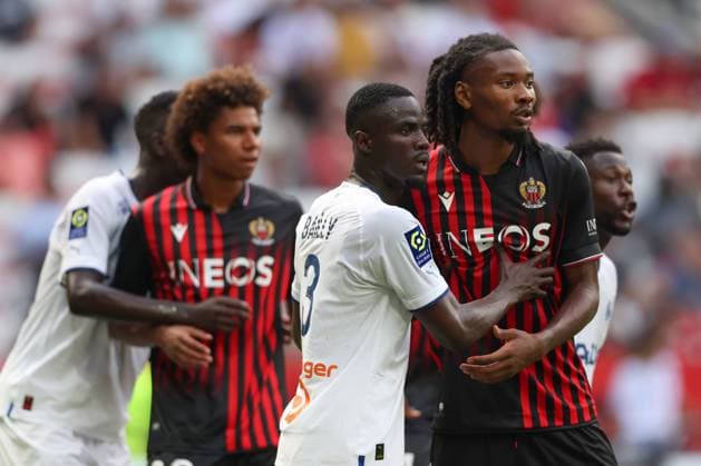 Nice, France, 28th August 2022. Eric Bailly of Olympique De Marseille gets to grips with Khephren Thuram of OGC Nice as they await a corner during the Uber Eats Ligue 1 match at Allianz Riviera Stadium, Nice. Picture credit should read: Jonathan Moscrop Sportimage EDITORIAL USE ONLY. No use with unauthorised audio, video, data, fixture lists, club league logos or live services. Online in-match use limited to 120 images, no video emulation. No use in betting, games or single club league player publications. SPI-1813-0030