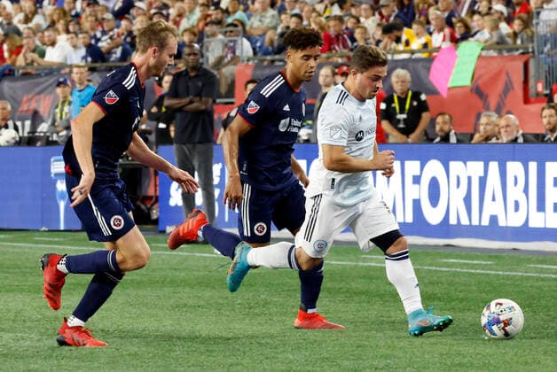 FOXBOROUGH, MA - AUGUST 31: New England Revolution defenders Henry Kessler (4) and Brandon Bye (15) chase Chicago Fire FC right winger Xherdan Shaqiri (10) during a match between the New England Revolution and the Chicago Fire FC on August 31, 2022, at Gillette Stadium in Foxborough, Massachusetts. (Photo by Fred Kfoury III Icon Sportswire) SOCCER: AUG 31 MLS, Fussball Herren, USA - Chicago Fire at New England Revolution Icon482220831034