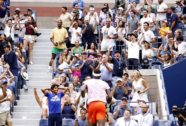 Fans react after Frances Tiafoe plays an exhausting point before defeating Rafael Nadal of Spain in 4 sets in the 4th round at the 2022 US Open Tennis Championships in Arthur Ashe Stadium at the USTA Billie Jean King National Tennis Center in New York City on Monday, September 5, 2022.  NYP20220905175 JOHNxANGELILLO