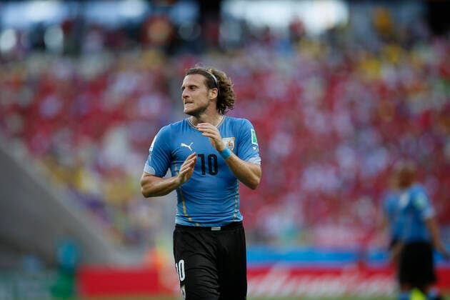 Sandro Pereyra-20140614SP_0633. Diego Forlan, de Uruguay, reacciona durante el juego entre Uruguay y Costa Rica por el Grupo D de la Copa Mundial de la FIFA Brasil 2014, el 14 de junio de 2014 en el Estadio Castelao en Fortaleza. Foto: Sandro Pereyra, La Diaria, Agencia Gamba.- Diego Forlan, de Uruguay. Estadio Castelao. *** Sandro Pereyra 20140614SP 0633 Diego Forlan, of Uruguay, reacts during the game between Uruguay and Costa Rica for Group D of the 2014 FIFA World Cup Brazil, on June 14, 2014 at the Castelao Stadium in Fortaleza Photo Sandro Pereyra, La Diaria, Agencia Gamba Diego Forlan, of Uruguay Castelao Stadium.