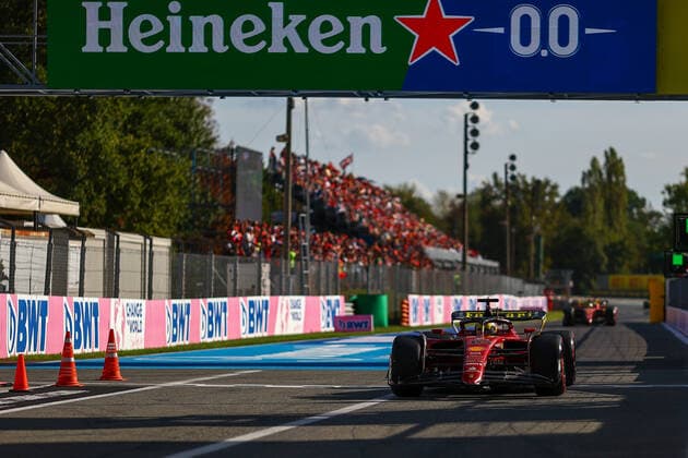 (220911) -- MONZA, Sept. 11, 2022 -- Ferrari s Monegasque driver Charles Leclerc (R) is seen after the qualifying session of the Formula 1 Italian Grand Prix at Monza Circuit, Italy, Sept. 10, 2022. (Photo by Xinhua) (SP)ITALY-MONZA-F1-ITALY GRAND PRIX-QUALIFYING QianxJun 