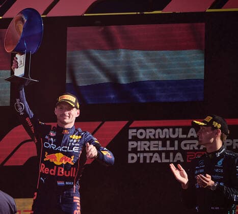 (220912) -- MONZA, Sept. 12, 2022 -- Max Verstappen (L) of Red Bull celebrates victory on the podium after the Italian Formula One Grand Prix at Monza Circuit, Italy, Sept. 11, 2022. ) (SP)ITALY-MONZA-F1-ITALY GRAND PRIX MengxDingbo 