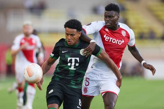 Monaco, Monaco, 15th September 2022. Benoit Badiashile of AS Monaco tussles with Ryan Mmaee of Ferencvaros during the UEFA Europa League match at Stade Louis II, Monaco. Picture credit should read: Jonathan Moscrop Sportimage EDITORIAL USE ONLY. No use with unauthorised audio, video, data, fixture lists, club league logos or live services. Online in-match use limited to 120 images, no video emulation. No use in betting, games or single club league player publications. SPI-1868-0001