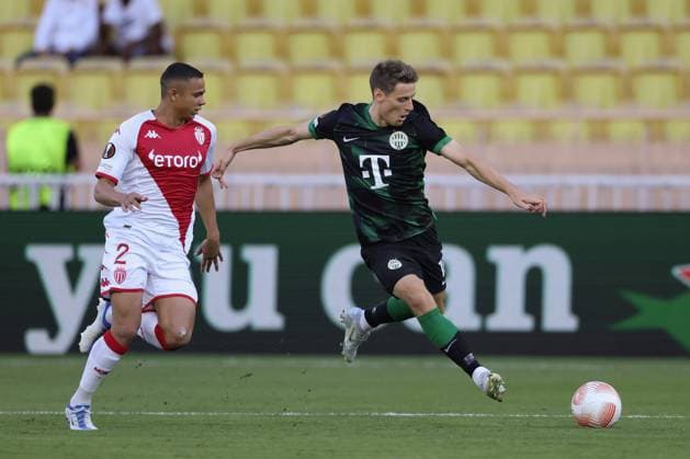 Fußball, EL, AS Monaco - Ferencvaros Budapest Monaco, Monaco, 15th September 2022. Kristoffer Zachariassen of Ferencvaros lines up a shot on goal as he is pursued by Vanderson of AS Monaco during the UEFA Europa League match at Stade Louis II, Monaco. Picture credit should read: Jonathan Moscrop Sportimage EDITORIAL USE ONLY. No use with unauthorised audio, video, data, fixture lists, club league logos or live services. Online in-match use limited to 120 images, no video emulation. No use in betting, games or single club league player publications. SPI-1868-0004