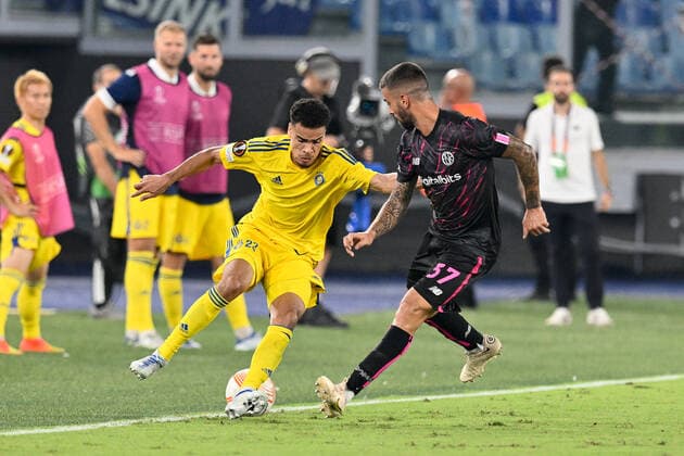 15th September 2022; Stadio Olimpico, Rome, Italy: Europa League football AS Roma versus HJk Helsinki: Jukka Raitala of HJk Helsinki and Leonardo Spinazzola of AS Roma  ActionPlus12426616 AllShotLive