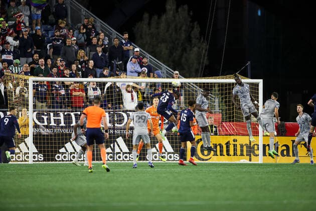 Sep 17, 2022; Foxborough, Massachusetts, USA; New England Revolution defender Jon Bell (23) rises for a header in a game against CF Montreal at Gillette Stadium. Cal Media USA - ZUMAc04_ 20220917_zaf_c04_603 Copyright: xBurtxGranofskyx