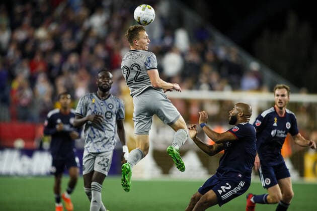 Sep 17, 2022; Foxborough, Massachusetts, USA; CF Montreal defender Alistair Johnson (22) rises for the header in a game against the New England Revolution at Gillette Stadium. Cal Media USA - ZUMAc04_ 20220917_zaf_c04_611 Copyright: xBurtxGranofskyx