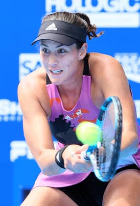 September 21, 2022, Tokyo, Japan - Former world s top ranker Gabrine Muguruza of Spain returns the ball against Despina Papamichail of Greece at the singles second round match at the Toray Pan Pacific Open tennis tournament at the Ariake Coliseum in Tokyo on Wednesday, September 21, 2022. Third seeded Muguruza defeated Papamichail 6-4, 6-2. Noxthirdxpartyxsales  (199128246)
