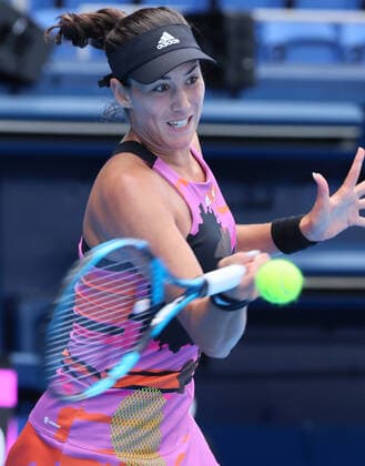 September 21, 2022, Tokyo, Japan - Former world s top ranker Gabrine Muguruza of Spain returns the ball against Despina Papamichail of Greece at the singles second round match at the Toray Pan Pacific Open tennis tournament at the Ariake Coliseum in Tokyo on Wednesday, September 21, 2022. Third seeded Muguruza defeated Papamichail 6-4, 6-2. Noxthirdxpartyxsales  (199128250)