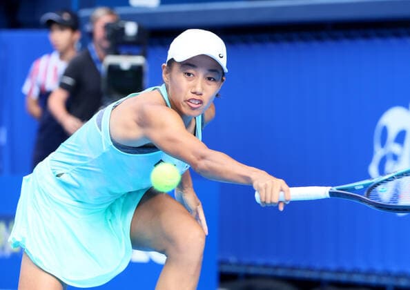 September 21, 2022, Tokyo, Japan - Zhang Shuai of China returns the ball against France s Caroline Garcia at the singles second round match at the Toray Pan Pacific Open tennis tournament at the Ariake Coliseum in Tokyo on Wednesday, September 21, 2022. Zhang defeated Garcia 4-6, 7-6, 7-6. Noxthirdxpartyxsales  (199133726)
