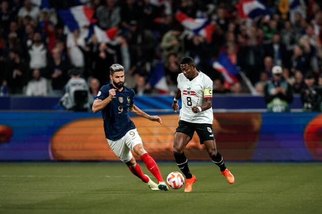 SOCCER - NL, FRA vs AUT SAINT DENIS,FRANCE,22.SEP.22 - SOCCER - UEFA Nations League, OEFB international match, Länderspiel, Nationalmannschaft France vs Austria. Image shows Olivier Giroud (FRA) and David Alaba (AUT).  GEPAxpictures xJohannesxFriedl