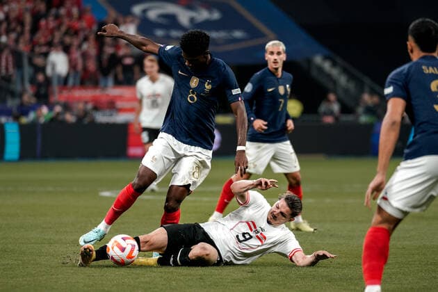 SOCCER - NL, FRA vs AUT SAINT DENIS,FRANCE,22.SEP.22 - SOCCER - UEFA Nations League, OEFB international match, Länderspiel, Nationalmannschaft France vs Austria. Image shows Aurelien Tchouameni (FRA) and Marcel Sabitzer (AUT).  GEPAxpictures xJohannesxFriedl