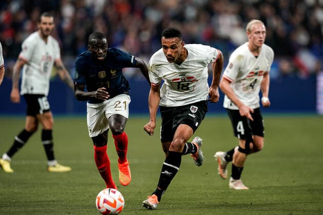 SOCCER - NL, FRA vs AUT SAINT DENIS,FRANCE,22.SEP.22 - SOCCER - UEFA Nations League, OEFB international match, Länderspiel, Nationalmannschaft France vs Austria. Image shows Ferland Mendy (FRA), Karim Onisiwo and Xaver Schlager (AUT).  GEPAxpictures xJohannesxFriedl