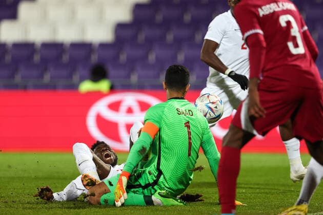 SOCCER - QAT vs CAN, test match VIENNA,AUSTRIA,23.SEP.22 - SOCCER - International test match, Qatar vs Canada. Image shows Alphonso Davies (CAN) and Saad Abdulla Alsheeb (QAT).  GEPAxpictures xArminxRauthner