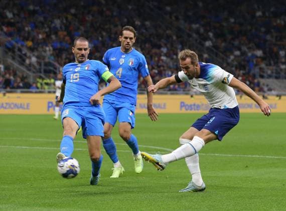 Milan, Italy, 23rd September 2022. Harry Kane of England shoots during the UEFA Nations League match at Stadio Giuseppe Meazza, Milan. Picture credit should read: Jonathan Moscrop Sportimage EDITORIAL USE ONLY. No use with unauthorised audio, video, data, fixture lists, club league logos or live services. Online in-match use limited to 120 images, no video emulation. No use in betting, games or single club league player publications. SPI-1892-0038