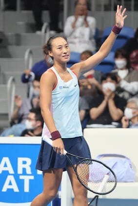 September 24, 2022, Tokyo, Japan - Zheng Qinwen of China reacts to audience as she defeated Veronika Kudermetova of Russia at the singles semi final match at the Toray Pan Pacific Open tennis tournament at the Ariake Coliseum in Tokyo on Saturday, September 24, 2022. Zheng defeated Kudermetova 5-7, 6-3, 7-6. Noxthirdxpartyxsales  (0169946609st)