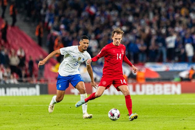 Denmark v France, UEFA Nations League, Copenhagen, Denmark Copenhagen, Denmark. 25th, September 2022. Mikkel Damsgaard (14) of Denmark and William Saliba (3) of France seen during the UEFA Nations League match between Denmark and France at Parken in Copenhagen. Copenhagen Denmark  Copyright: xGonzalesxPhoto DejanxObretkovicx