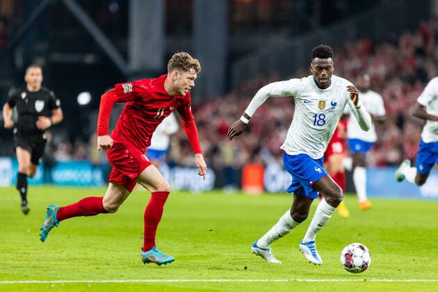 Denmark v France, UEFA Nations League, Copenhagen, Denmark Copenhagen, Denmark. 25th, September 2022. Andreas Olsen Olsen (11) of Denmark and Benoit Badiashile (18) of France seen during the UEFA Nations League match between Denmark and France at Parken in Copenhagen. Copenhagen Denmark  Copyright: xGonzalesxPhoto DejanxObretkovicx
