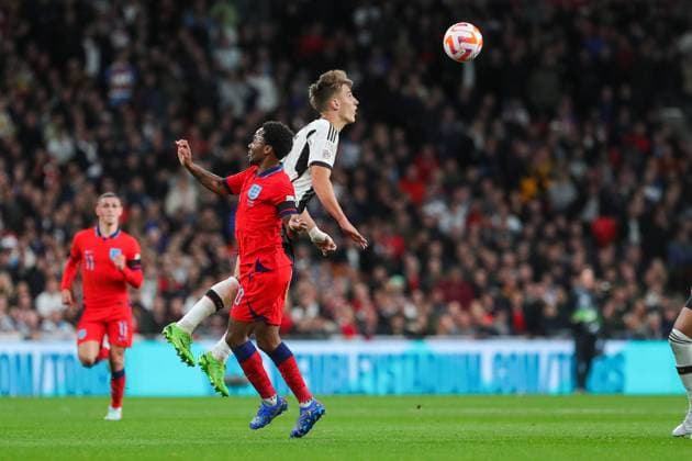 England v Germany UEFA Nations League 26 2022. Germany Nico Schlootterbeck heads from England Raheem Sterling during the UEFA Nations League match between England and Germany at Wembley Stadium, London, England on 26 September 2022. London Wembley Stadium Greater London England Editorial use only , Copyright: xPhilxDuncanx PSI-16044-0012