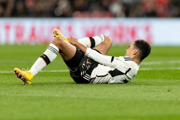 Mandatory Credit: Photo by Juan Gasparini JMP Shutterstock (13421987bu) Jamal Musiala of Germany looks injured after being fouled by Harry Maguire of England in the penalty area England v Germany, UK - 26 Sep 2022 Editorial use only England v Germany, UK - 26 Sep 2022 Editorial use only  Copyright: xJuanxGasparini JMP Shutterstockx 13421987bu