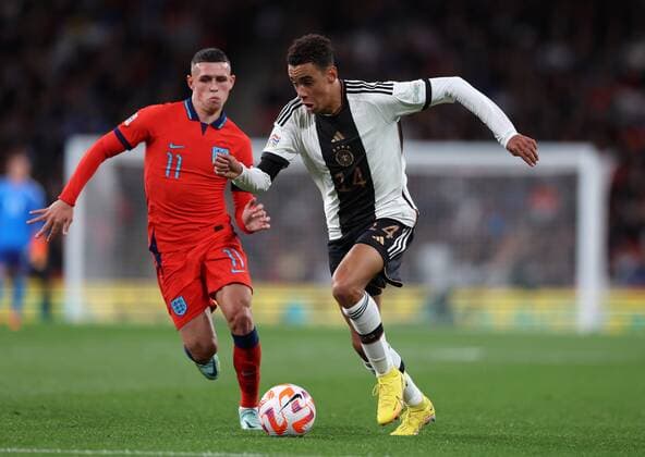 Mandatory Credit: Photo by JASONPIX Shutterstock (13422306aj) Jamal Musiala of Germany with Phil Foden of England England v Germany, UEFA Nationals League, Group A3. Football, Wembley Stadium. UK. 26 SEP 2022 Editorial use only England v Germany, UEFA Nationals League, Group A3. Football, Wembley Stadium. UK. 26 SEP 2022 Editorial use only  Copyright: xJASONPIX Shutterstockx 13422306aj