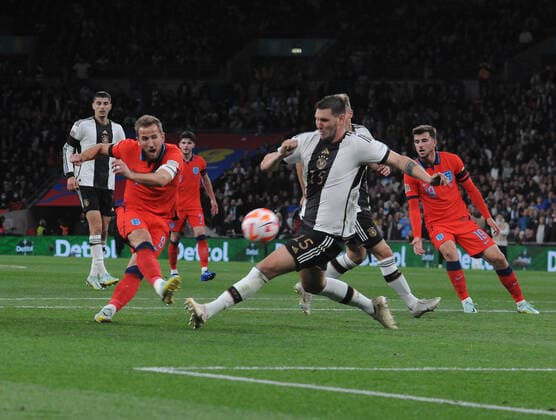 Football - 2023 UEFA Nations League - Group C - Round Six - England vs Germany - Wembley Stadium - Monday 26th September 2022 Harry Kane of England shoots at goal 