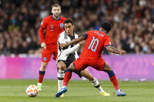 Jamal Musiala of Germany and Raheem Sterling of England during the UEFA Nations League Group C match between England and Germany at Wembley Stadium Where: London, United Kingdom When: 26 Sep 2022 Credit: Daniel phcimages Cover Images **NOT AVAILABLE FOR PUBLICATION IN UK NEWSPAPERS** Copyright: xDaniel phcimages CoverxImagesx 52016328 EDITORIAL USE ONLY. RESTRICTED TO NEWSPAPERS BASED IN THE UK