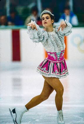 Olympics Figure skating, Eiskunstlauf Katarina Witt (GDR) Gold medalist and Olympic Champion competing in the Ladies Figure Skating Short Program at the 1984 Olympic Winter games, Winterspiele,Spiele, Summer games Sarajevo Zetra Olympic Hall Yugoslavia Copyright: xPaulxJxSutton Duomo PCNx FG1601 067270