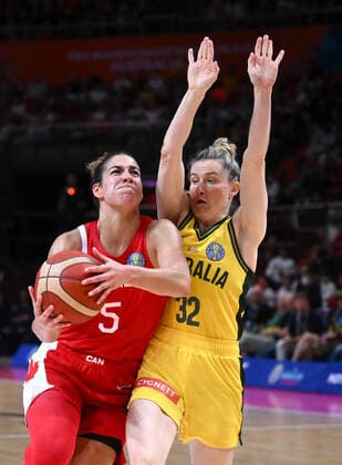 BASKETBALL WOMENS WORLD CUP 3RD, Kia Nurse (left) of Canada lays up for a basket against Samantha Whitcomb (right) of Australia during the 2022 FIBA Women s Basketball World Cup 3rd Place match between Australia and Canada at Qudos Bank Arena in Sydney, Saturday, October 1, 2022. ( NO ARCHIVING, EDITORIAL USE ONLY, NO USE IN BOOKS WITHOUT CONSENT SYDNEY NEW SOUTH WALES AUSTRALIA  Copyright: xJAMESxGOURLEYx 20221001001709923293
