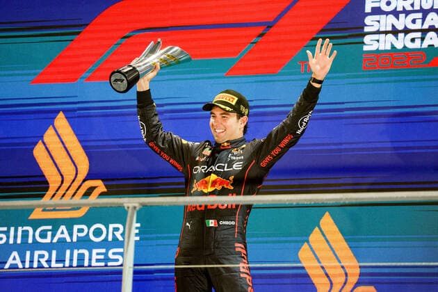 PEREZ Sergio (mex), Red Bull Racing RB18, portrait, podium during the Formula 1 Singapore Airlines Singapore Grand Prix 2022, 17th round of the 2022 FIA Formula One World Championship, WM, Weltmeisterschaft from September 30 to October 02, 2022 on the Marina Bay Street Circuit, in Singapore - F1 - SINGAPORE GRAND PRIX 2022 - RACE DPPI Panoramic  GOOD4811
