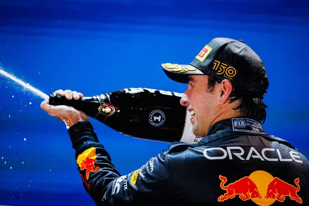 PEREZ Sergio (mex), Red Bull Racing RB18, portrait podium during the Formula 1 Singapore Airlines Singapore Grand Prix 2022, 17th round of the 2022 FIA Formula One World Championship, WM, Weltmeisterschaft from September 30 to October 02, 2022 on the Marina Bay Street Circuit, in Singapore - F1 - SINGAPORE GRAND PRIX 2022 - RACE DPPI Panoramic  00122040__V2_4769