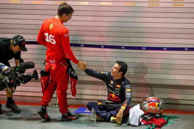 LECLERC Charles (mco), Scuderia Ferrari F1-75, and PEREZ Sergio (mex), Red Bull Racing RB18, portrait during the Formula 1 Singapore Airlines Singapore Grand Prix 2022, 17th round of the 2022 FIA Formula One World Championship, WM, Weltmeisterschaft from September 30 to October 02, 2022 on the Marina Bay Street Circuit, in Singapore - F1 - SINGAPORE GRAND PRIX 2022 - RACE DPPI Panoramic  _V2_4132
