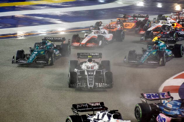 Start, 22 Yuki Tsunoda (JPN, Scuderia AlphaTauri), 18 Lance Stroll (CAN, Aston Martin Aramco Cognizant F1 Team), 5 Sebastian Vettel (DEU, Aston Martin Aramco Cognizant F1 Team), 20 Kevin Magnussen (DNK, Haas F1 Team), F1 Grand Prix of Singapore at Marina Bay Street Circuit on October 2, 2022 in Singapore, Singapore. (Photo by HOCH ZWEI) Singapore Singapore
