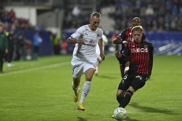 Ondrej Mihalik of Slovacko, left, and Melvin Bard of Nice in action during the UEFA Conference League, 3rd round, Group D match 1. FC Slovacko vs OGC Nice in Uherske Hradiste, Czech Republic, October 6, 2022. (CTKxPhoto DaliborxGluck) CTKPhotoP2022100608565 