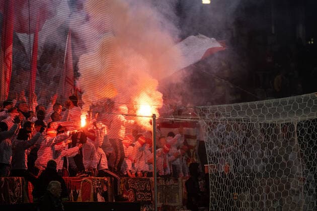 221006 Supporters of Union Berlin burning bengals during the UEFA Europa League match between Malmö FF and Union Berlin on October 6, 2022 in Malmö. Photo: Petter Arvidson BILDBYRAN kod PA PA0409 fotboll football soccer fotball uefa europa league malmö ff union berlin bbeng pyroteknik publik Copyright: PETTERxARVIDSON BB221006PA059