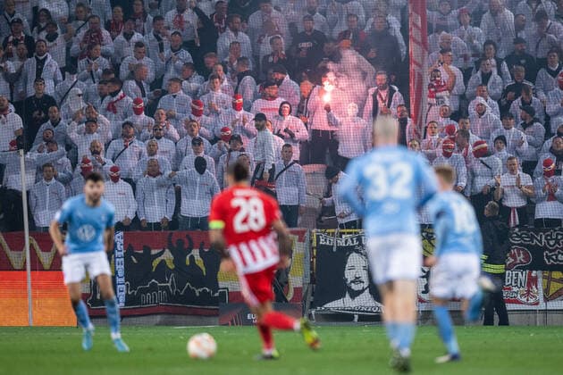 221006 Supporters of Union Berlin during the UEFA Europa League match between Malmö FF and Union Berlin on October 6, 2022 in Malmö. Photo: Petter Arvidson BILDBYRAN kod PA PA0409 fotboll football soccer fotball uefa europa league malmö ff union berlin bbeng publik pyroteknik Copyright: PETTERxARVIDSON BB221006PA089