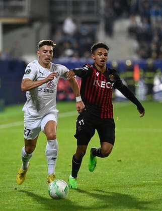Michal Tomic of Slovacko, left, and Sofiane Diop of Nice in action during the UEFA Conference League, 3rd round, Group D match 1. FC Slovacko vs OGC Nice in Uherske Hradiste, Czech Republic, October 6, 2022. (CTKxPhoto DaliborxGluck) CTKPhotoP2022100609221  dg008A