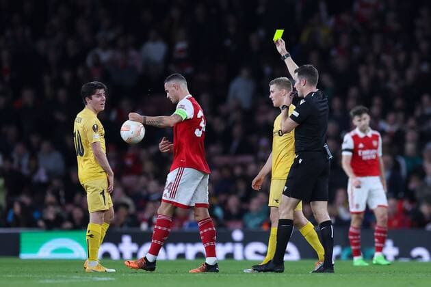 Mandatory Credit: Photo by Simon Dael Shutterstock (13442648ag) Granit Xhaka of Arsenal is shown a yellow card Arsenal v Bodo Glimt, UEFA Europa League, Group A, Football, Emirates Stadium, London, UK - 06 Oct 2022 EDITORIAL USE ONLY No use with unauthorised audio, video, data, fixture lists, club league logos or live services. Online in-match use limited to 120 images, no video emulation. No use in betting, games or single club league player publications. Arsenal v Bodo Glimt, UEFA Europa League, Group A, Football, Emirates Stadium, London, UK - 06 Oct 2022 EDITORIAL USE ONLY No use with unauthorised audio, video, data, fixture lists, club league logos or live services. Online in-match use limited to 120 images, no video emulation. No use in betting, games or single club league player publications.  Copyright: xSimonxDael Shutterstockx 13442648ag