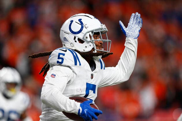 DENVER, CO - OCTOBER 06: Indianapolis Colts Cornerback Stephon Gilmore (5) celebrates his interception in the end zone late in the fourth quarter of play during and NFL, American Football Herren, USA game between the Indianapolis Colts and the Denver Broncos on October 06, 2022 at Empower Field at Mile High in Denver CO. (Photo by Jeffrey Brown Icon Sportswire) NFL: OCT 06 Colts at Broncos Icon100622015