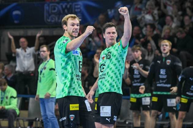 09.10.2022, xlakx, Handball Liqui Moly HBL, Fuechse Berlin - THW Kiel emspor, v.l. Mathias Gidsel (Fuechse Berlin 19),Hans Lindberg (Fuechse Berlin 18),Jubel, Torjubel, jubelt ueber das Tor, celebrate the goal, celebration Berlin