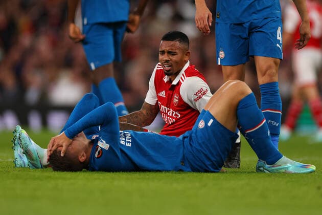 20th October 2022; Emirates Stadium, London, England; Europa League Football, Arsenal versus PSV Eindhoven; Gabriel Jesus of Arsenal speaks to the injured Joey Veerman of PSV Eindhoven  ActionPlus12438006 ShaunxBrooks
