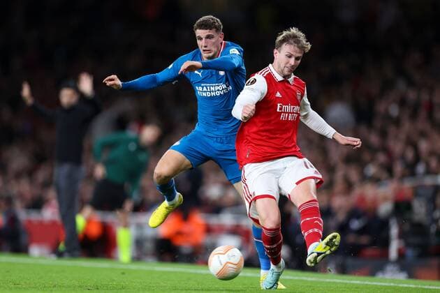 Mandatory Credit: Photo by Simon Dael Shutterstock (13480677q) Rob Holding of Arsenal under pressure from Guus Til of PSV Eindhoven Arsenal v PSV Eindhoven, UEFA Europa League, Group A, Football, Emirates Stadium, London, UK - 20 Oct 2022 EDITORIAL USE ONLY No use with unauthorised audio, video, data, fixture lists, club league logos or live services. Online in-match use limited to 120 images, no video emulation. No use in betting, games or single club league player publications. Arsenal v PSV Eindhoven, UEFA Europa League, Group A, Football, Emirates Stadium, London, UK - 20 Oct 2022 EDITORIAL USE ONLY No use with unauthorised audio, video, data, fixture lists, club league logos or live services. Online in-match use limited to 120 images, no video emulation. No use in betting, games or single club league player publications. Copyright: xSimonxDael Shutterstockx 13480677q
