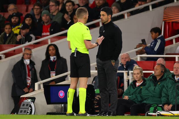 20th October 2022; Emirates Stadium, London, England; Europa League Football, Arsenal versus PSV Eindhoven; Referee Alejandro Hernandez speaks to Arsenal Manager Mikel Arteta  ActionPlus12438028 ShaunxBrooks