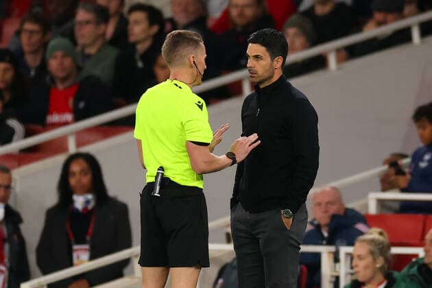 20th October 2022; Emirates Stadium, London, England; Europa League Football, Arsenal versus PSV Eindhoven; Referee Alejandro Hernandez speaks to Arsenal Manager Mikel Arteta  ActionPlus12438029 ShaunxBrooks