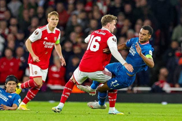 Arsenal v PSV Eindhoven Europa League 20 10 2022. Group A Cody Gakpo (11) of PSV Eindhoven brought down by Rob Holding (16) of Arsenal during the Europa League match between Arsenal and PSV Eindhoven at the Emirates Stadium, London, England on 20 October 2022. Editorial use only , Copyright: xNigelxKeenex PSI-16182-0062