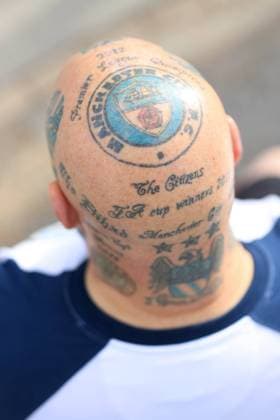 Football - Premier League - Manchester City v Brighton & Hove Albion 22nd October 2022 - Premier League - Manchester City v Brighton & Hove Albion - A Manchester City shows off a range of tattoos on his head and neck - Photo: Simon Stacpoole Offside. Manchester UK Copyright: xSimonxStacpoolexOffside